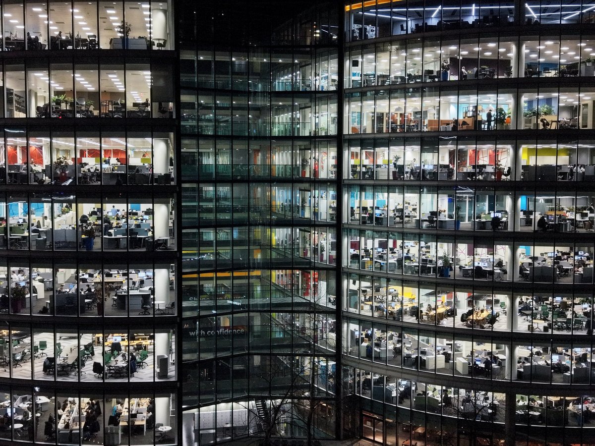Modern glass office building representing North Texas business environment